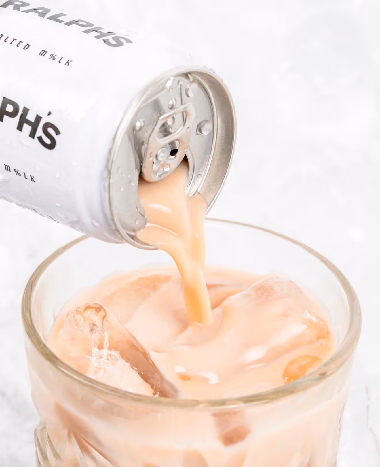 Ralph's Malted Mlk being poured into a glass
